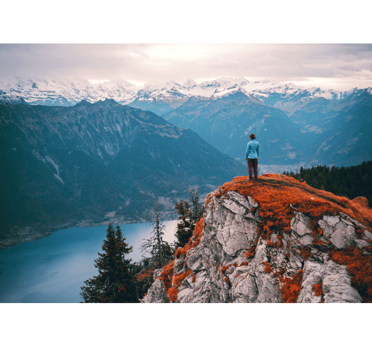 Fotomural de montañas Persona solitaria en la cima - TenVinilo