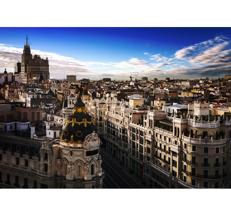 Fotomural Madrid Gran vía con nubes al atardecer - TenVinilo