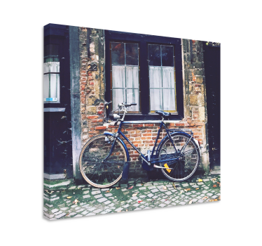 Cuadro ciudades bicicleta cerca de ladrillo - TenVinilo