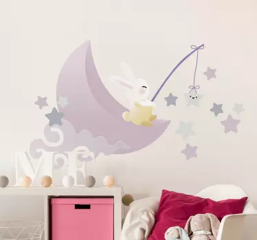 Vinilo decorativo ilustración Conejo en la luna lanzando estrella - TenVinilo