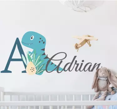 Vinilo infantil dinosaurio azul bebé con nombre - TenVinilo