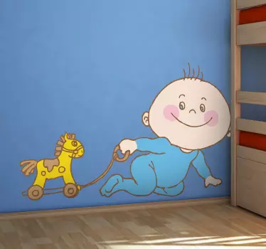 Vinilo infantil bebé con juguete de caballo - TenVinilo
