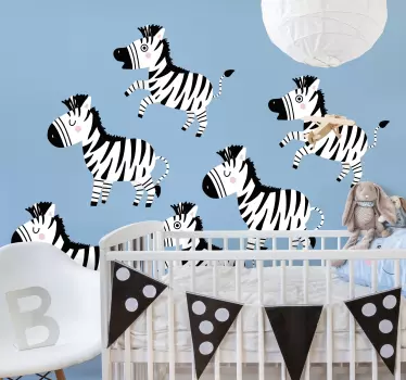 Vinilo pared infantil personajes de cebra juguetones - TenVinilo