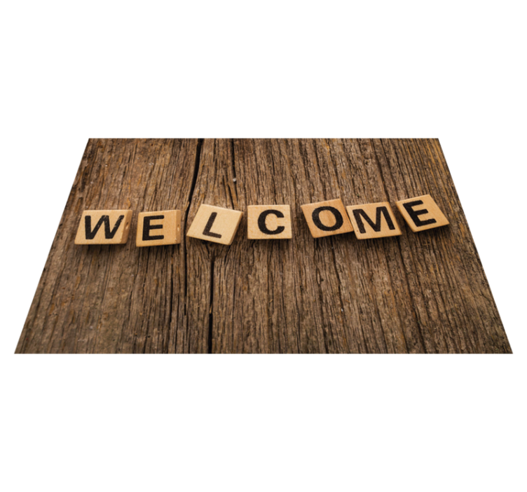 Alfombra vinílica con frase alfabeto de madera de bienvenida - TenVinilo