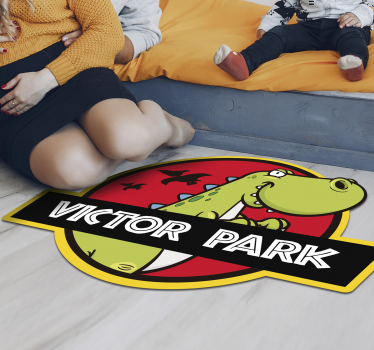 Alfombra vinilo infantil parque jurasico con nombre - TenVinilo